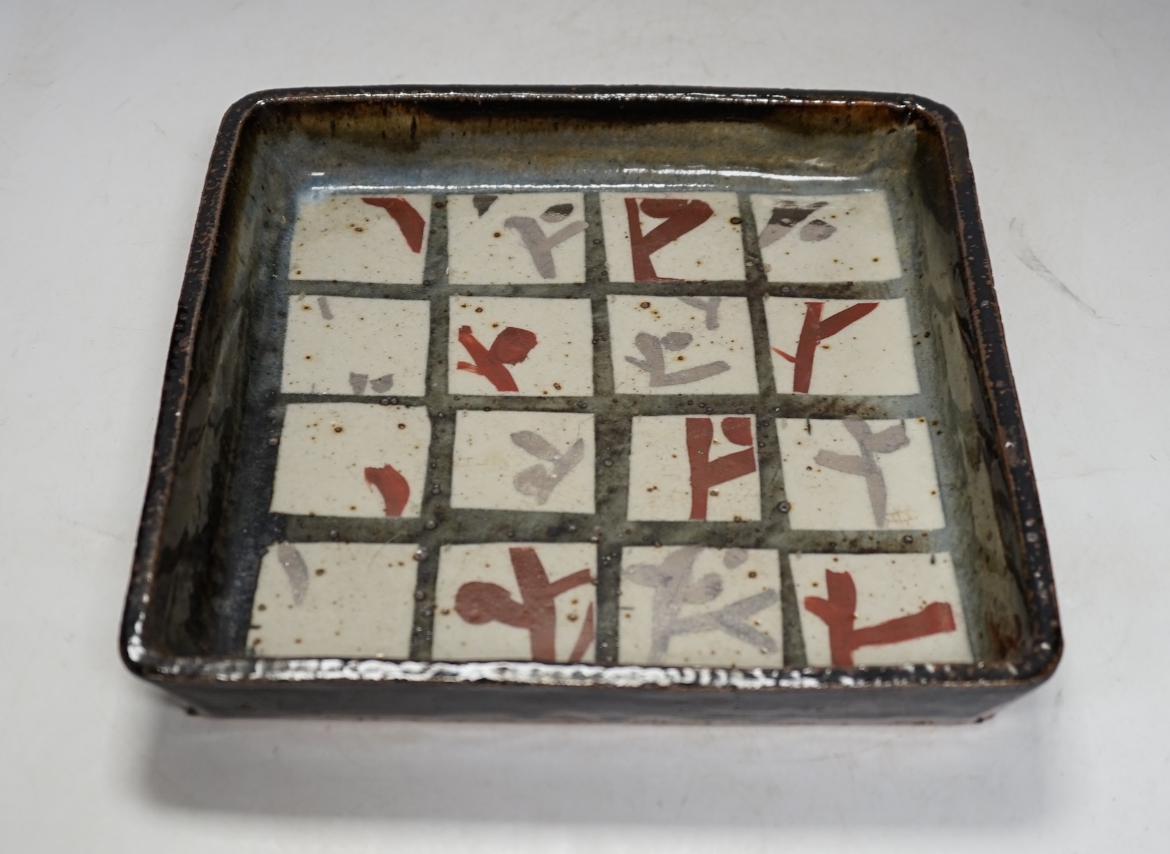 John Maltby (1936-2020), a studio pottery square dish, 23.5cm sq. Condition - good